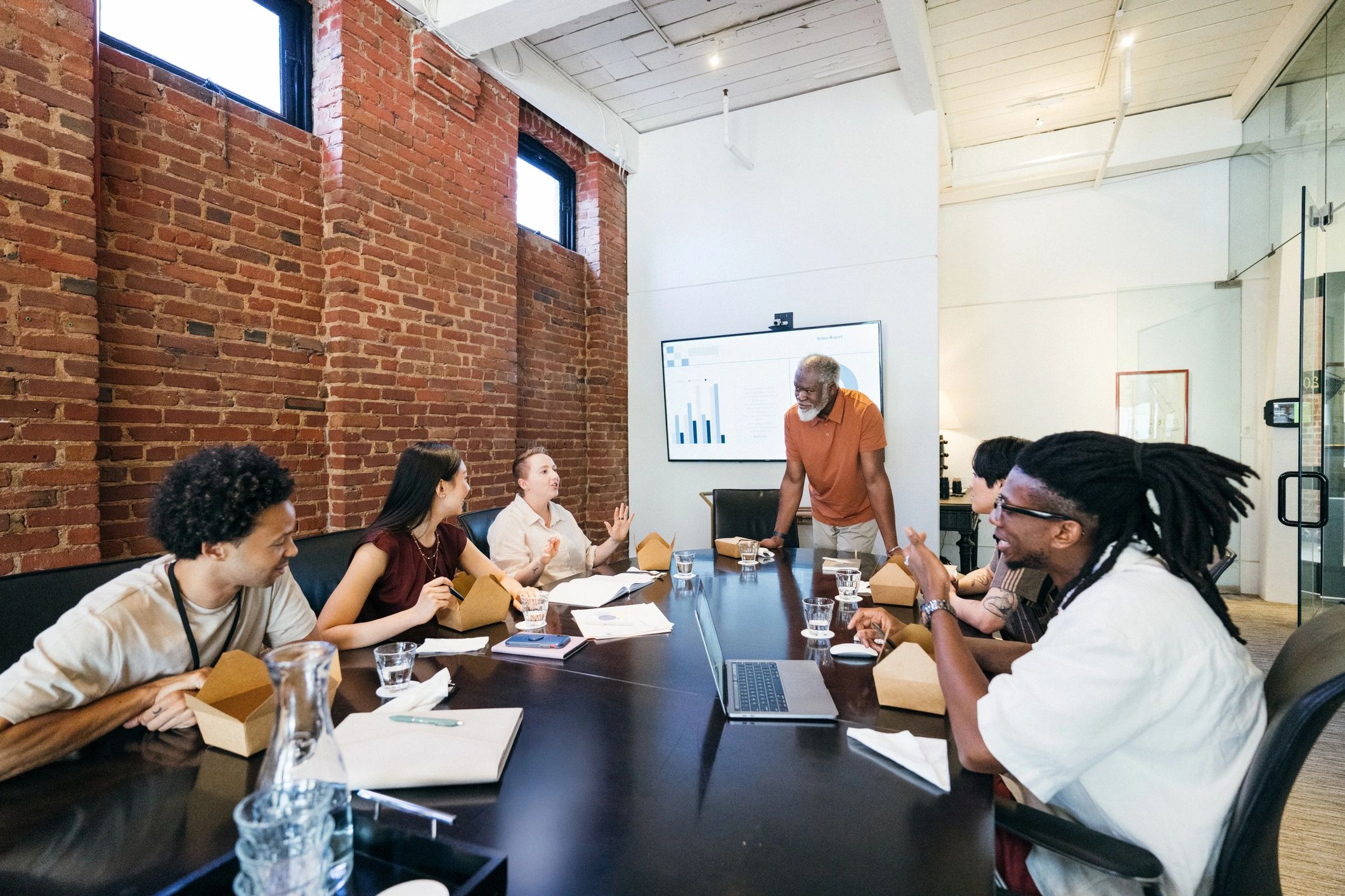 Research team collaborating in a boardroom